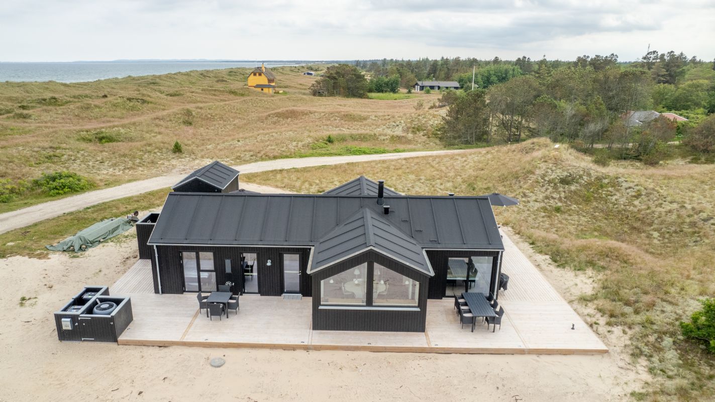 Skagensol - splinternyt sommerhus 8 prs - 150 m til en af Danmarks bedste badestrande. 